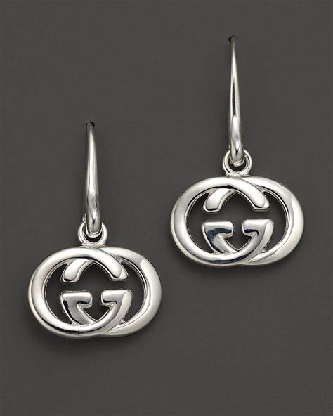 gucci silver gg earrings|Gucci silver dangling earrings.